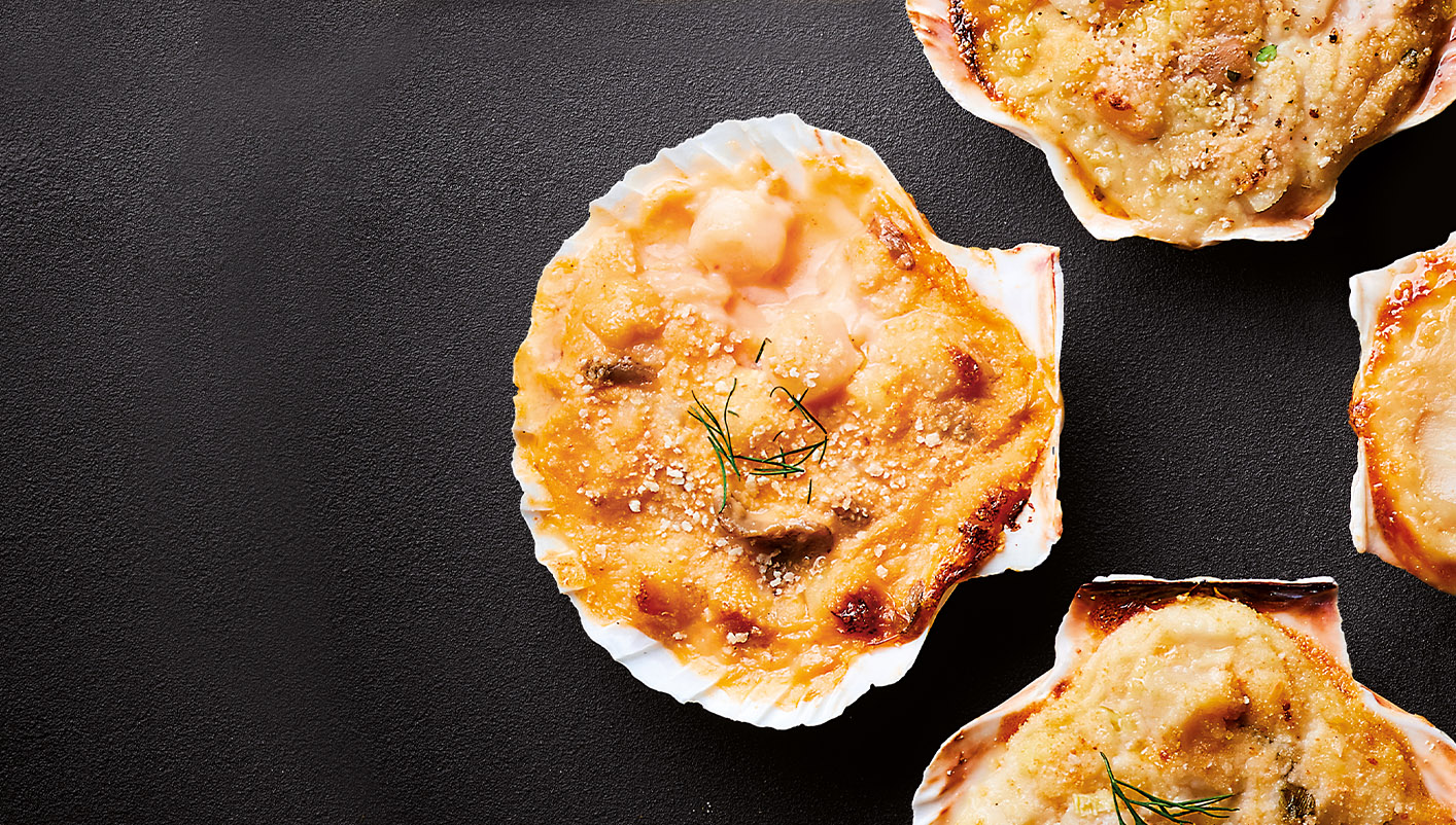 4 Coquilles St-Jacques* sauce Cognac F. Champagne
