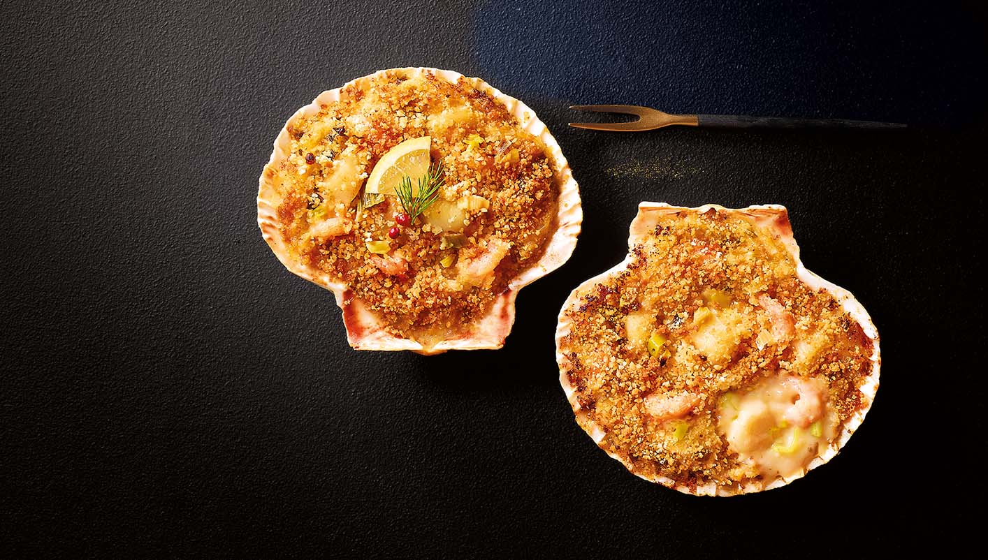 2 coquilles St-Jacques* et crevette, sauce aux poireaux