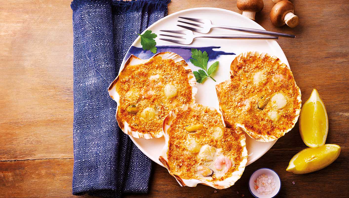 4 Coquilles St-Jacques aux fruits de mer, sauce bretonne