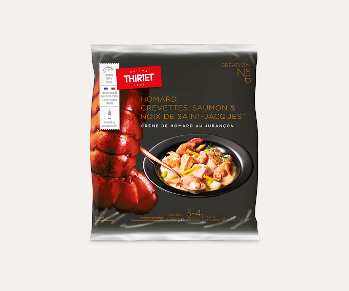 Homard, crevettes, saumon et noix de St-Jacques, crème