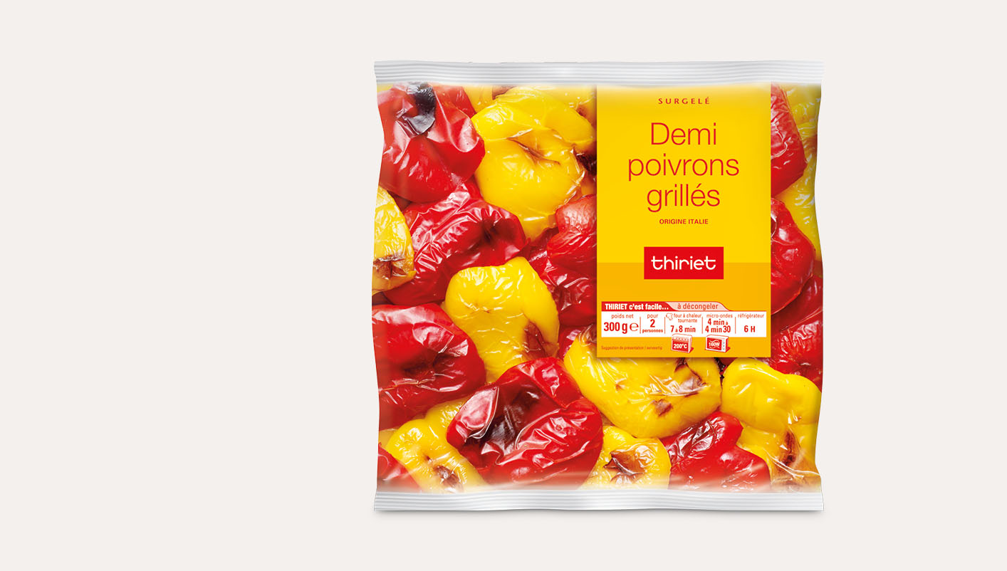 Demi-poivrons jaunes et rouges grillés